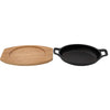 REGENT COOKWARE CAST IRON OVAL PAN WITH 2 HANDLES ON A WOODEN BOARD, (225X120X55MM)